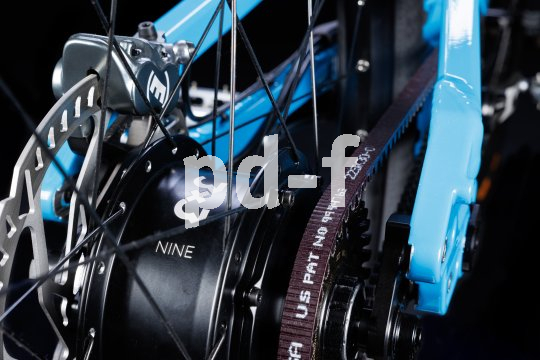 Detailbild einer Getriebenabe der Firma 3x3 in einem Fahrrad mit Antriebsriemen verbaut.